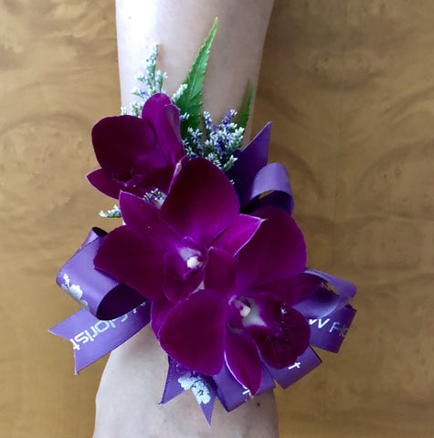 Orchid wrist corsages